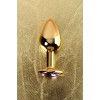 Фото товара: Золотистая коническая анальная пробка с фиолетовым кристаллом - 7 см., код товара: 717004-15/Арт.184035, номер 7