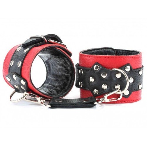 Купить Красные наручники с чёрными проклёпанными ремешками с пряжкой код товара: 51013ars/Арт.49061. Секс-шоп в СПб - EROTICOASIS | Интим товары для взрослых 